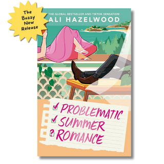 Book cover for 'Problematic Summer Romance' by Ali Hazelwood, featuring an illustrated scene of a woman in a pink dress reclining on a beach chair by the ocean, with a yellow burst reading 'The Buzzy New Release' in the top-left corner.